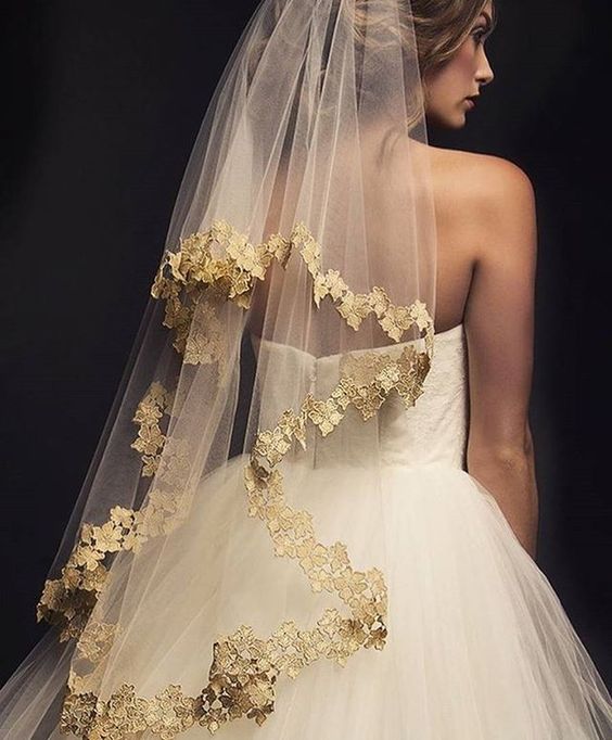 fingertip veil with blusher Fingertip gold lace trimmed veil with blusher. Gorgeous!