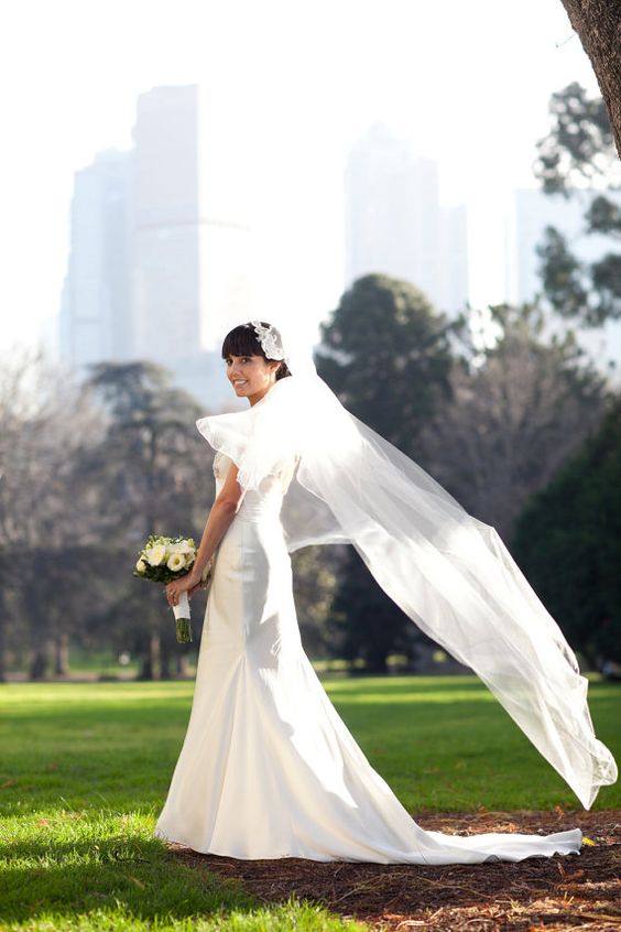 cathedral wedding veil with Swarovski crystals Silk cathedral wedding veil with Swarovski crystals and rhinestone pencil edge with blusher.