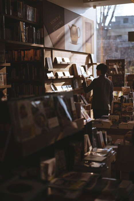  a man browsing in a bookstore 