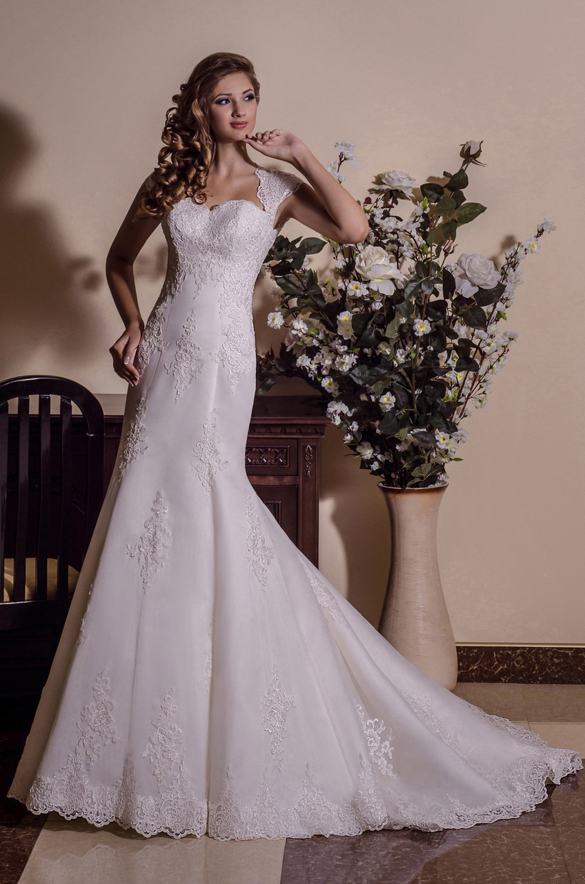 Свадебные и вечерние платья