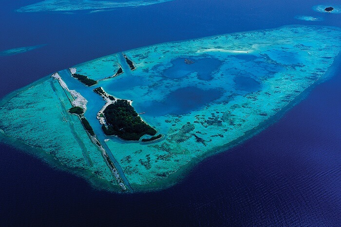 An aerial view of the blue waters surrounding the Kepulauan Seribu