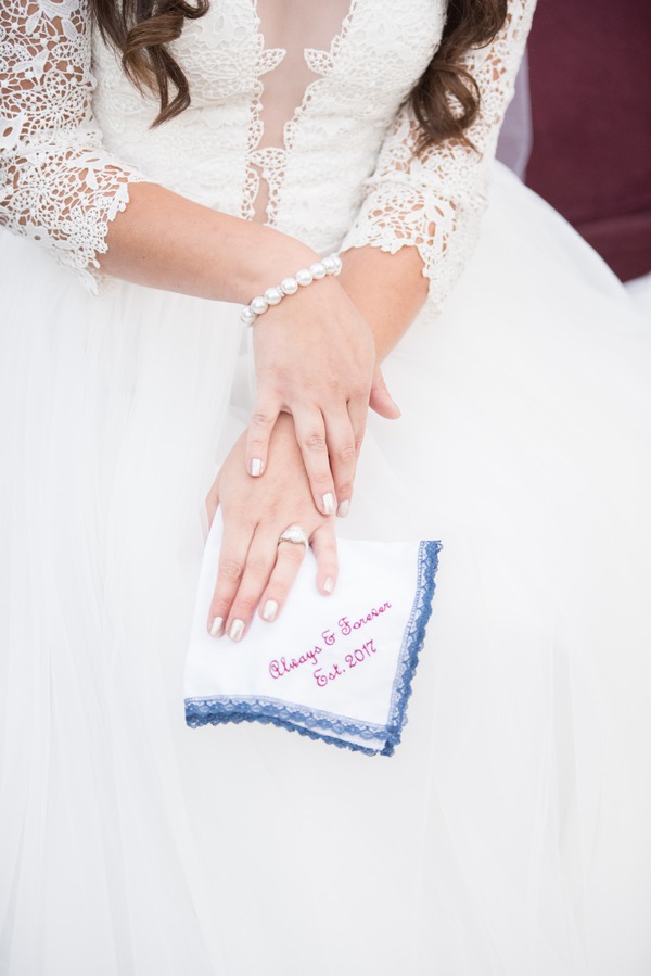 bride holding her personalized handkerchief