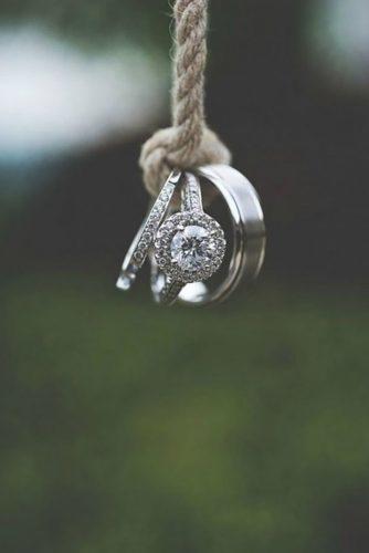 must take wedding photos hanging-wedding-rings-evie claire photography