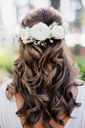 wedding hairstyles with flowers curly half up half down with roses jessicagoldphoto