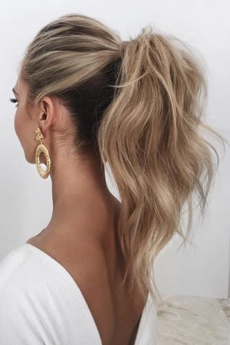wedding hairstyles for curly hair simple high blonde ponytail saasha_burns