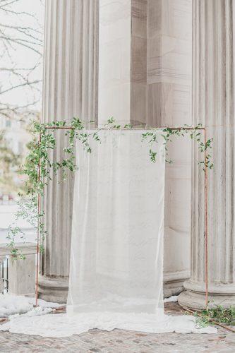 wedding ideas minimalist bridal altar with greenery and white cloth decorus fine art photography
